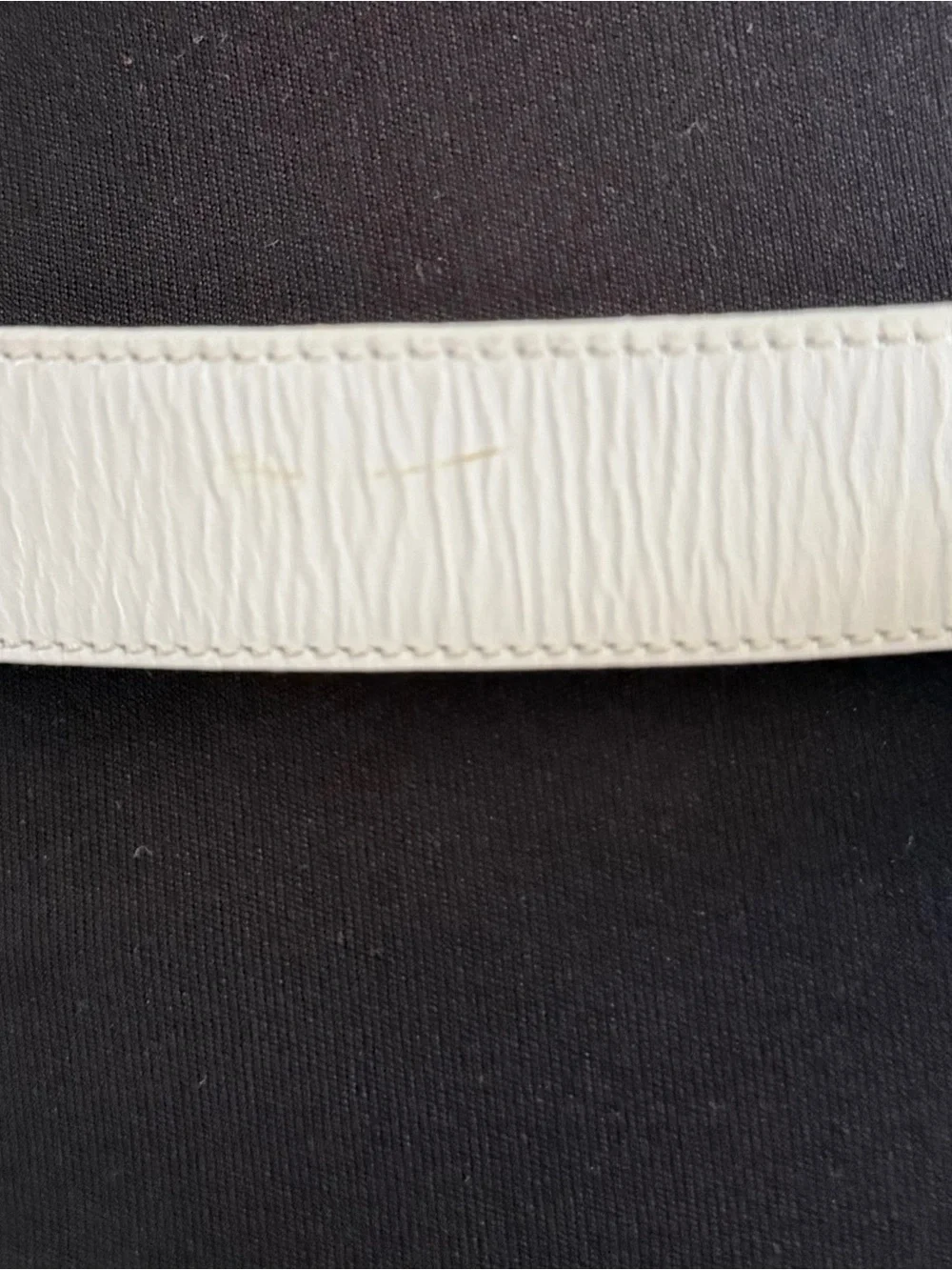pierre cardin white belt textured, leather-and gold-tone buckle.